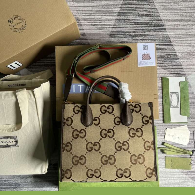 G*u*i shopping bags
